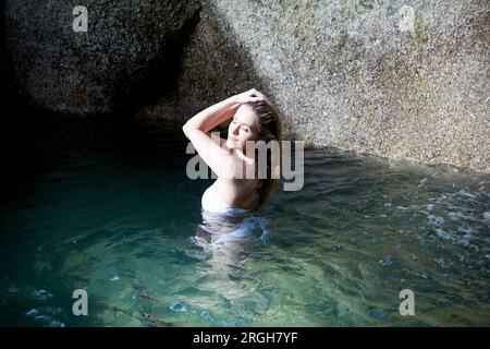 Young woman swimming in Ko Samui, Thailand Stock Photo