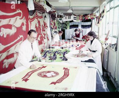 Circa 1950, London, England, United Kingdom: Making flags to be used for the Coronation Festivities. (Credit Image: © Keystone Press Agency/ZUMA Press Wire). EDITORIAL USAGE ONLY! Not for Commercial USAGE! Stock Photo