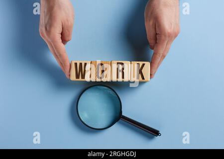 The word work written on wooden dice Stock Photo