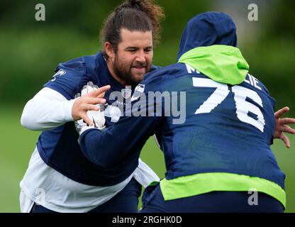 Seattle Seahawks tackle Jalen McKenzie (76) walks on the field