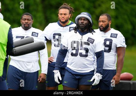 Seattle Seahawks defensive tackle Myles Adams (95) walks off the