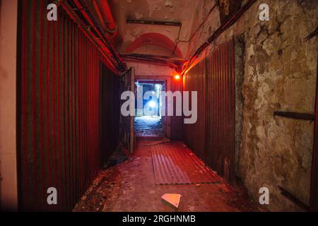 Old corridor of Soviet bunker, echo of Cold War. Stock Photo