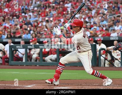 ST. LOUIS, MO - JULY 15: St. Louis Cardinals left fielder Lars Nootbaar  (21) singles in the first inning during the second game of a MLB  doubleheader between the Washington Nationals and