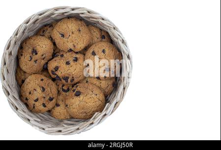 Chocolate chip cookies in a bamboo basket isolated on white background Stock Photo