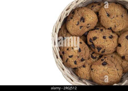 Chocolate chip cookies in a bamboo basket isolated on white background Stock Photo