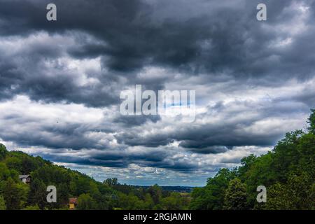 Stormy clouds over the hills in the countryside, Croatia Stock Photo