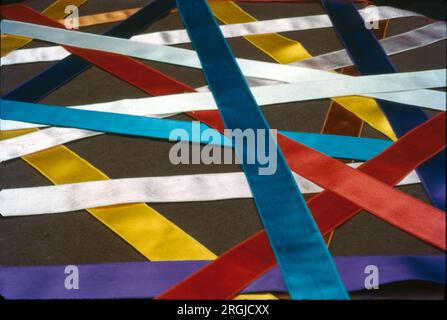 Coloured Sattin Strips in Pattern as Background, Colors, Graffiti, India. Stock Photo