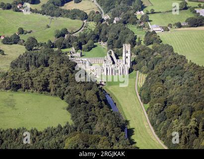 Aerial view taken from over 1500' of Fountains Abbey, near Ripon, one of the largest and best preserved ruined Cistercian monasteries in England. Stock Photo