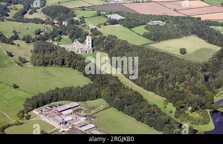 Aerial view taken from over 1500' of Fountains Abbey, near Ripon, one of the largest and best preserved ruined Cistercian monasteries in England. Stock Photo