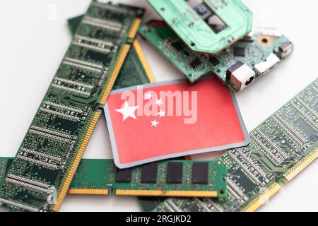 Flag of China on a processor, CPU Central processing Unit or GPU microchip on a motherboard. manufacturer, demonstrating the country's superiority in Stock Photo