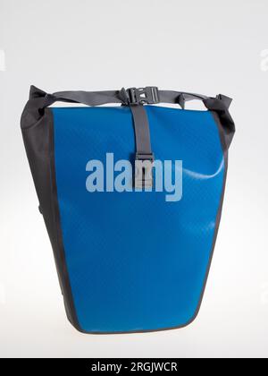 blue bag for bike luggage bicycle carrier on white background Stock Photo
