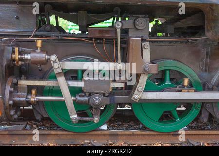 The driving wheels of steam locomotive "Axe", built at Stoke-on-Trent in 1915, at Woody Bay staion on the Lynton and Barnstaple Railway, Devon, UK Stock Photo