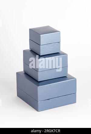 Jewelry Boxes on white background. Various sizes jewelry boxes opened. Three boxes in a row. Stock Photo