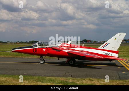 Former RAF jet trainer Red Gnat Display Team Folland Gnat T1 taxiing out at Biggin Hill for an air display. Ex military Royal Air Force 1960s era jet Stock Photo