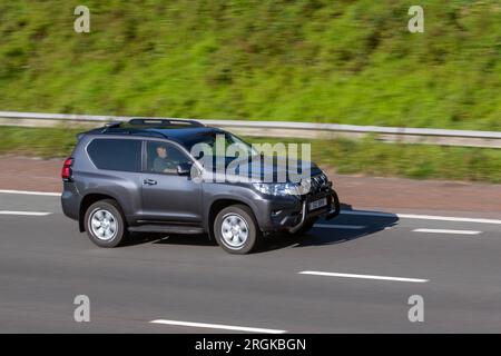 2020 Toyota Land Cruiser Active COM A,   D-4D 204 SWB Auto Start/Stop Grey LCV Hardtop Van Diesel 2755 cc; travelling at speed on the M6 motorway in Greater Manchester, UK Stock Photo
