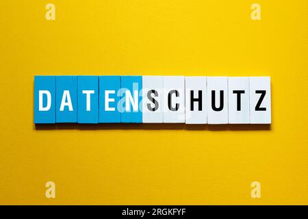 Datenschutz - data protection on german,word concept on building blocks, text Stock Photo