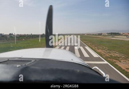 Stock photo of the views from the window of light aircraft while taking off. Stock Photo