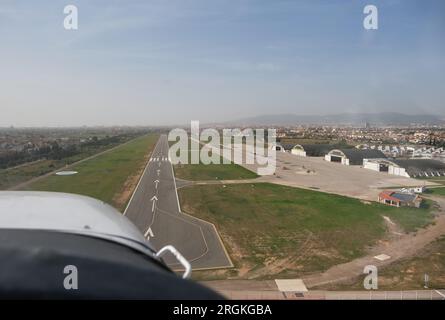 Stock photo of the views from the window of light aircraft while taking off. Stock Photo