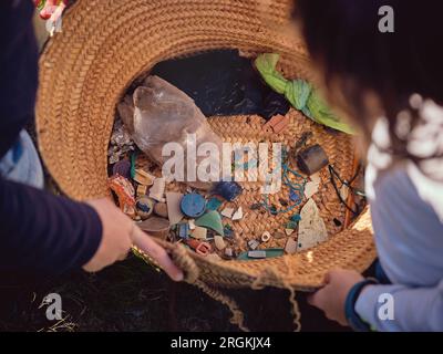 From above of crop unrecognizable preteen boy standing barefoot on ...