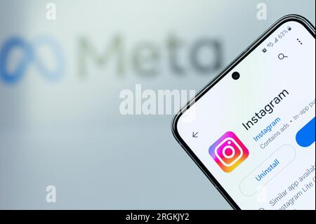 New York, USA - August 6, 2023: Open Instagram app on smartphone screen close up with blurred logo background Stock Photo