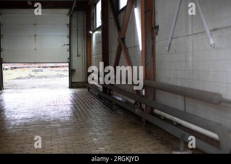 Items in garage. Workplace for creating structure. Production shop. Working tools on table. Stock Photo