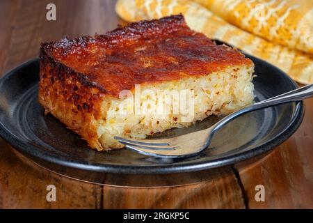 A serving or slice of Orange Pie. This is a Greek specialty known as Portokalopita. Its made with phyllo pastry and soaked in an orange syrup Stock Photo
