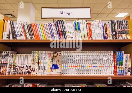 Mangas on display in a manga bookstore in Ikebukuro. Manga themed trading  cards, figures, cds and merchandise are produced by 'Animate Ltd' a chain  retailing arm of Movic, which is a Japanese