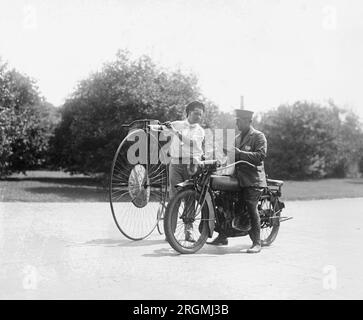 Velocipede and motorcycle ca. 1921 Stock Photo