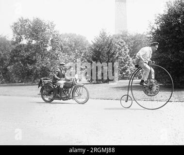 Velocipede and motorcycle ca. 1921 Stock Photo