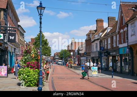 Shops and pedestrians on the High Street at Hitchin, Hertfordshire, UK Stock Photo
