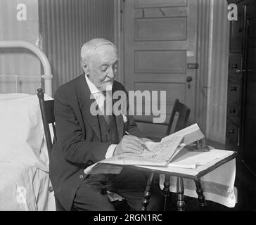 Ambrose Hines, 100 yr old with crossword puzzle ca. 1925 Stock Photo