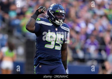 Seattle Seahawks defensive tackle Myles Adams (95) walks off the field  after an NFL football game against the Carolina Panthers, Sunday, Dec. 11,  2022, in Seattle, WA. The Panthers defeated the Seahawks