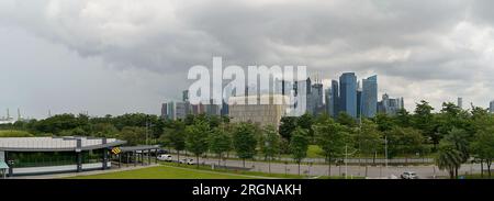 Panorama of Marina Bay skyline from the south, with CBD in background and terminals of the Tanjong Pagar container port in far left Stock Photo