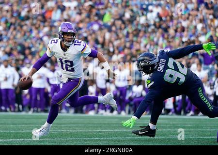 Seattle Seahawks linebacker Tyreke Smith (92) sacks Dallas Cowboys  quarterback Will Grier (15) during an NFL pre-season football game,  Saturday, Aug. 19, 2023 in Seattle. (AP Photo/Ben VanHouten Stock Photo -  Alamy