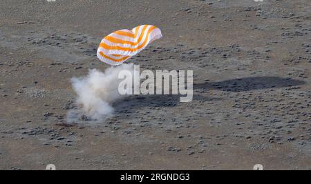 The Soyuz MS-19 spacecraft is seen as it lands in a remote area near the town of Zhezkazgan, Kazakhstan with Expedition 66 crew members Mark Vande Hei of NASA, and cosmonauts Pyotr Dubrov, and Anton Shkaplerov of Roscosmos, Wednesday, March 30, 2022. Vande Hei and Dubrov are returning to Earth after logging 355 days in space as members of Expeditions 64-66 aboard the International Space Station. For Vande Hei, his mission is the longest single spaceflight by a U.S. astronaut in history. Shkaplerov is returning after 176 days in space, serving as a Flight Engineer for Expedition 65 and commande Stock Photo