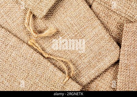 Several Burlap Sacks or Bags isolated with copy space Stock Photo