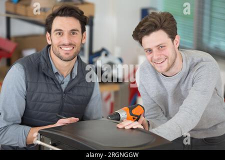 trainer and apprentice in vocational training Stock Photo