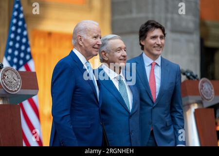 Reportage: President Joe Biden poses for a photo with Mexican President Andres Manuel Lopez Obrador and Canadian Prime Minister Justin Trudeau after delivering a joint press statement at the North American Leaders’ Summit, Tuesday, January 10, 2023, at the National Palace in Mexico City. Stock Photo