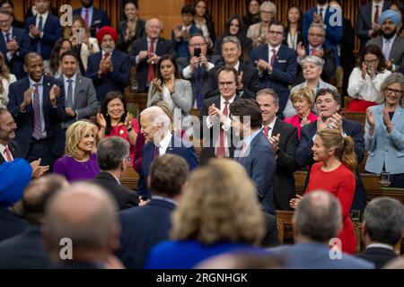 Reportage: President Biden visit to Ottawa Canada (2023) - President Joe Biden, joined by First Lady Jill Biden and First Lady of Canada Sophie Gregoire Trudeau, attends Canadian Prime Minister Justin Trudeau’s address to a joint session of Parliament, Friday, March 24, 2023, at Parliament Hill in Ottawa, Ontario, Canada. Stock Photo