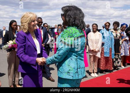 Reportage: First Lady Jill Biden visits Africa (February 2023) - First Lady Jill Biden greets Madam Monica Geingos, First Lady of the Republic of Namibia, and other officials on Wednesday, February 22, 2023, upon arriving to Hosea Kutako International Airport in Namibia. Stock Photo