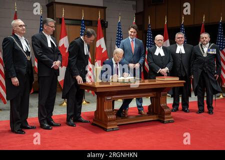 Reportage: President Biden visit to Ottawa Canada (2023) - President Joe Biden participates in a welcome ceremony and signs the guest books for the House and Senate, Friday, March 24, 2023, at Parliament Hill in Ottawa, Ontario, Canada. Stock Photo