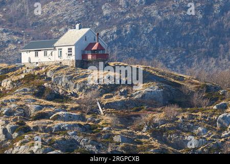 The Historic Norwegian Bjørnøy Lighthouse, Built In 1890, Located On The Small Island Of Bjørnøya, 16km North Of Bodø, Norway. 4 May 2023. Stock Photo