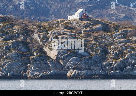 The Historic Norwegian Bjørnøy Lighthouse, Built In 1890, Located On The Small Island Of Bjørnøya, 16km North Of Bodø, Norway. 4 May 2023. Stock Photo