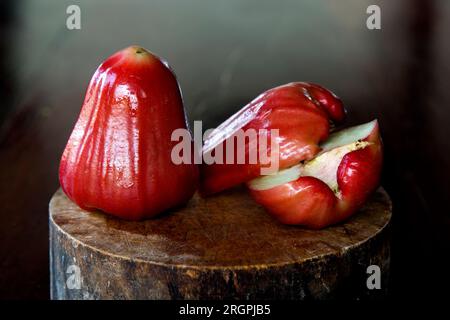 Rose apple, sometimes called a wax apple or a rose pear is a traditional fruit in Thailand. Stock Photo