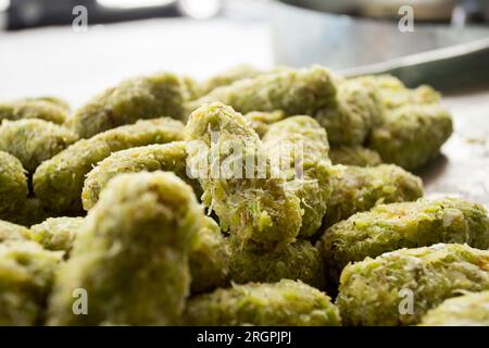 Fried banana in a street food stall in the city of Bangkok in Thailand.. Stock Photo