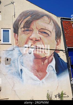 Mark E Smith, The Fall mural, on gable end of Chips at No8, 8 Clifton Rd, Prestwich, Bury, Manchester, England, UK,  M25 3HQ Stock Photo