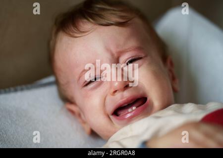 Agitated baby crying Stock Photo