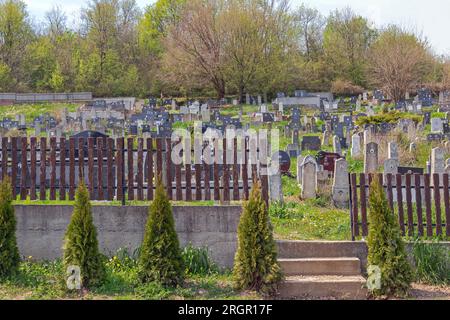 Sopot, Serbia - April 13, 2020: Serbian Orthodox Cemetery in Nemenikuce Village at Spring Day Stock Photo