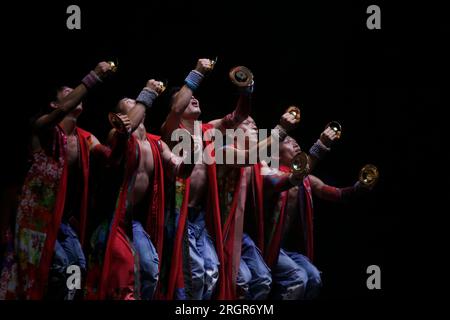Madrid, Spain. 09th Aug, 2023. Artists from the group of musicians 'YAMATO Drummers', are seen on stage during the presentation of their show 'Tenmei' (Destiny in Japanese), at the 39th edition of Veranos de la Villa, at the Conde Duque Cultural Center, in Madrid, on August 9, 2023. 'Yamato Drummers' is a group made up of dozens of musicians who have performed in more than 54 countries since it was created in 1993 in the Nara prefecture (Japan). (Photo by Hugo Ortuño/Pacific Press/Sipa USA) Credit: Sipa USA/Alamy Live News Stock Photo
