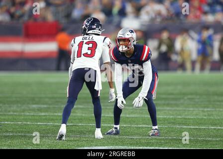 August 10, 2023; Foxborough, MA, USA; New England Patriots cornerback Jack  Jones (13) defends Houston Texans wide receiver Tank Dell (13) in action  during the NFL pre-season game between Houston Texans and